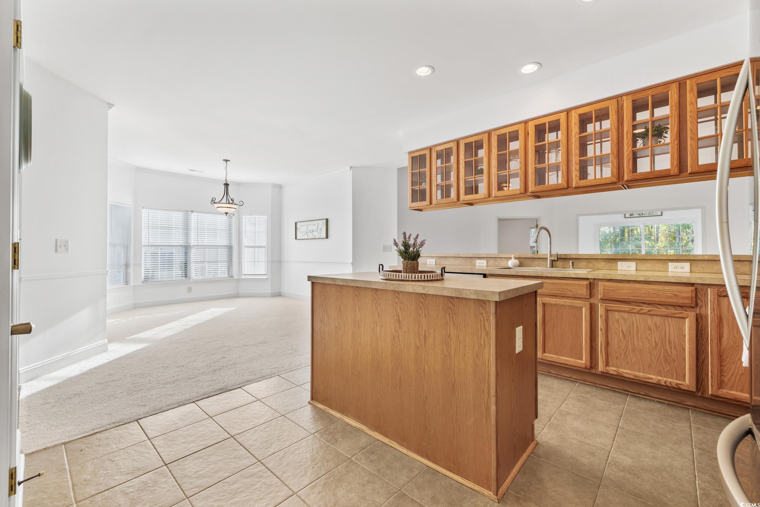 673 Botany Loop, Unit 673 Murrells Inlet, SC 29576 - Photo 17 of 39 Kitchen featuring light colored carpet, sink, plen