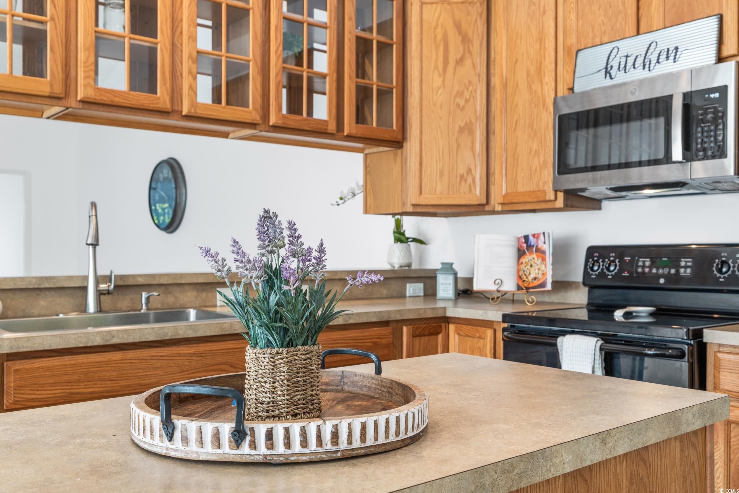 673 Botany Loop, Unit 673 Murrells Inlet, SC 29576 - Photo 18 of 39 Kitchen featuring black range with electric cookto