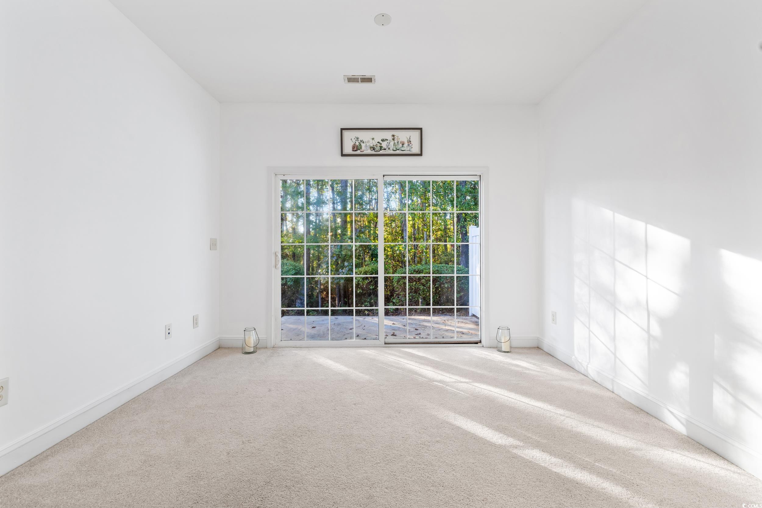 673 Botany Loop, Unit 673 Murrells Inlet, SC 29576 - Photo 26 of 39 Unfurnished room featuring carpet floors