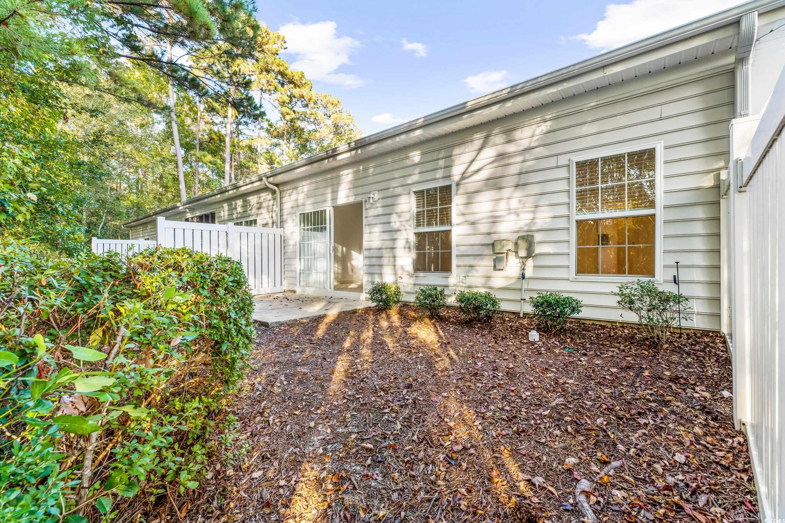 673 Botany Loop, Unit 673 Murrells Inlet, SC 29576 - Photo 33 of 39 Exterior space with a patio