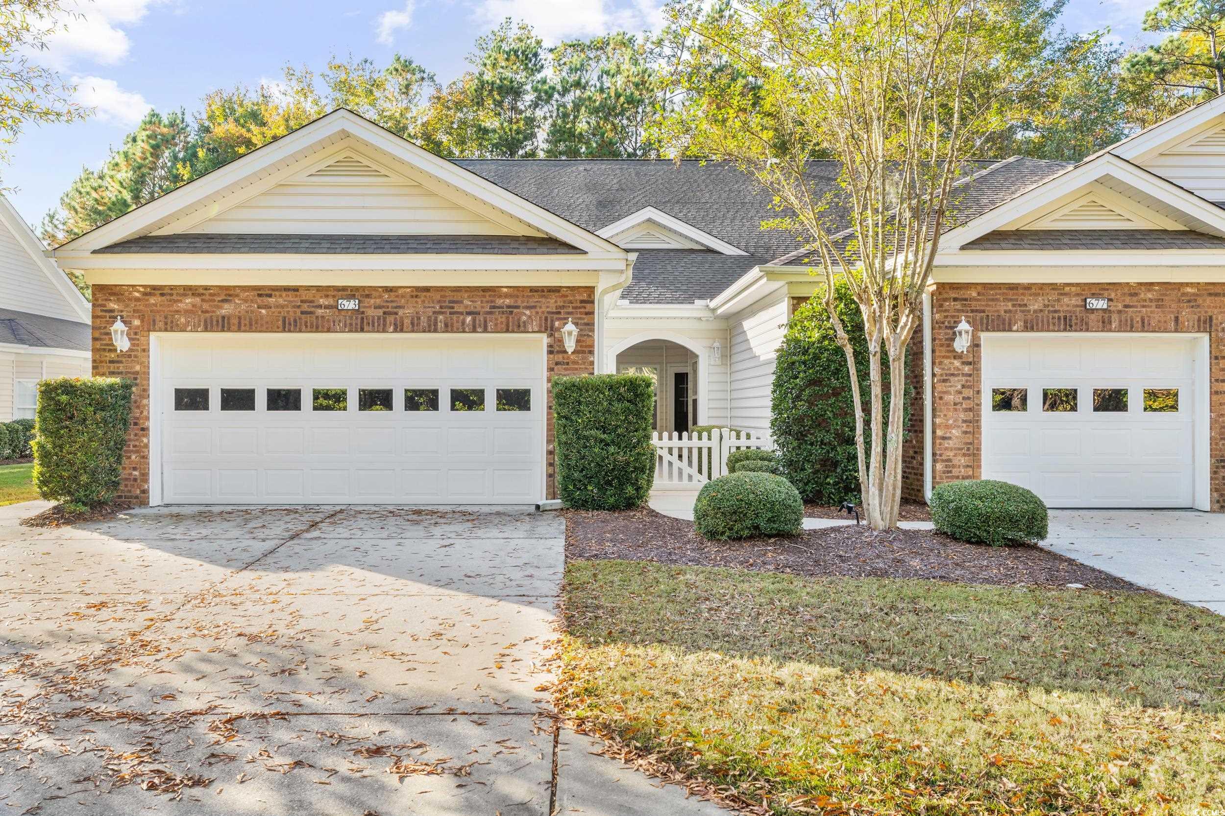 673 Botany Loop, Unit 673 Murrells Inlet, SC 29576 - Photo 5 of 39 View of front of house with a garage