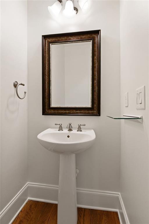 956 Persimmon Point Northeast Sandy Springs, GA 30328 - Photo 20 of 35 a bathroom with a sink and a mirror