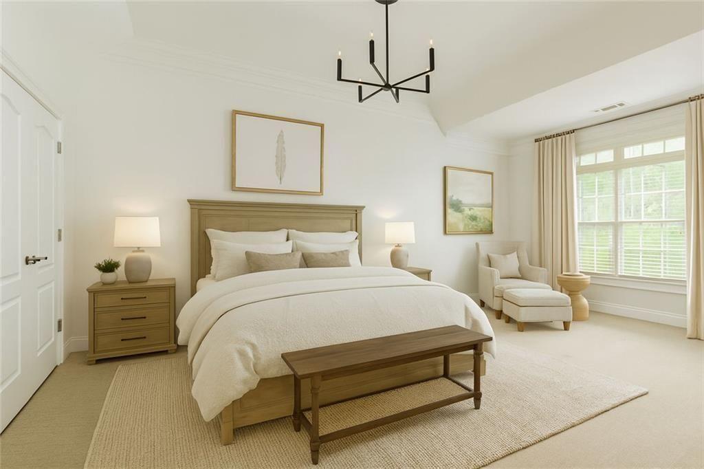 956 Persimmon Point Northeast Sandy Springs, GA 30328 - Photo 22 of 35 a spacious bedroom with a bed and ceiling fan