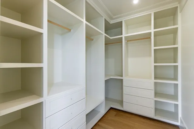 a view of an empty walk in closet