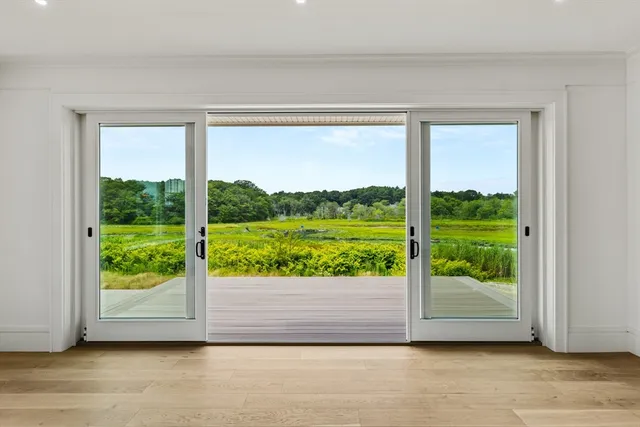 a view of a room that has a window