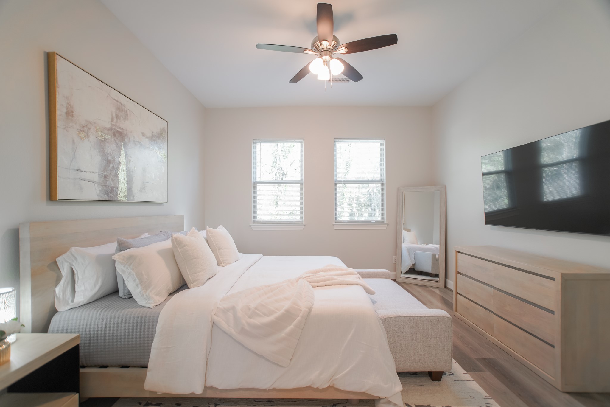 504 Nursery Road, Unit 3206 The Woodlands, TX 77380 - Photo 26 of 35 a bedroom with a large bed and a window