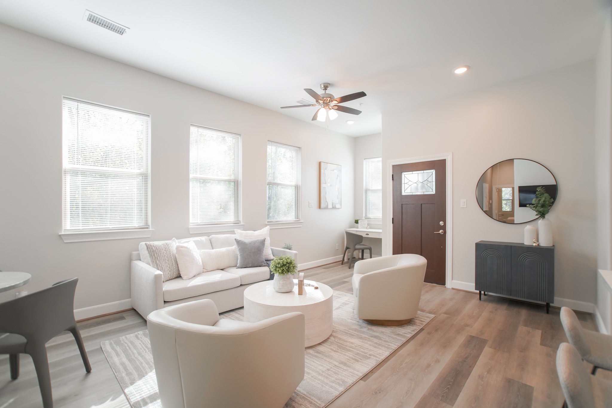 504 Nursery Road, Unit 3206 The Woodlands, TX 77380 - Photo 9 of 35 a living room with furniture a window and a table