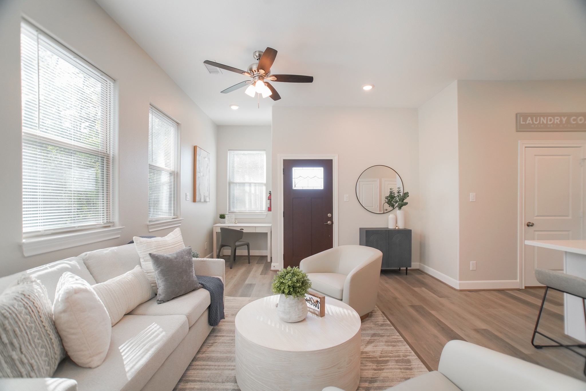 504 Nursery Road, Unit 3206 The Woodlands, TX 77380 - Photo 10 of 35 a living room with furniture and a large window