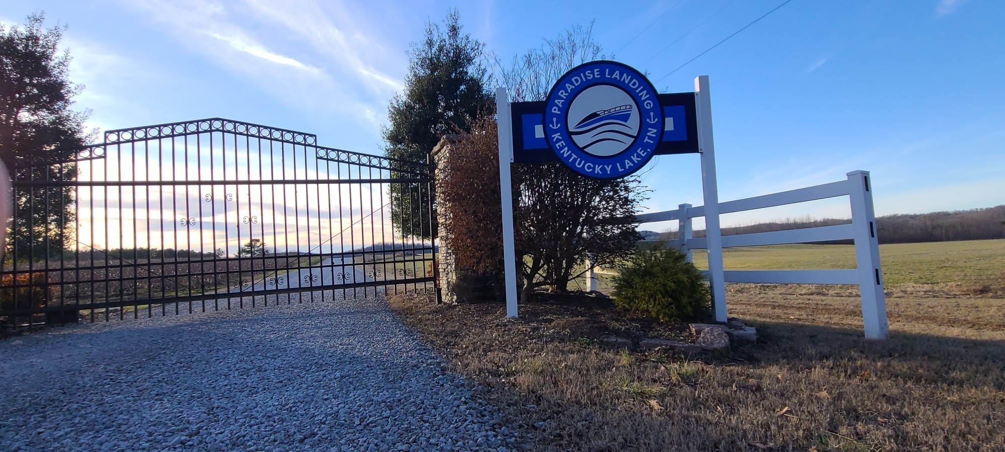 1947 Hardin Bottom Road Clifton, TN 38425 - Photo 24 of 26 a view of a house with a small yard and a large tree