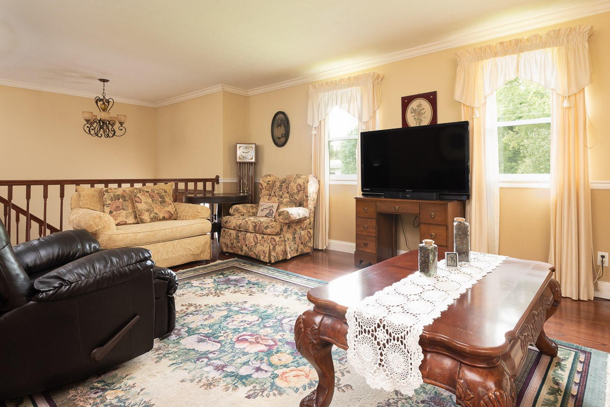120 Cedar Road Clinton, TN 37716 - Photo 9 of 15 a living room with furniture and a flat screen tv