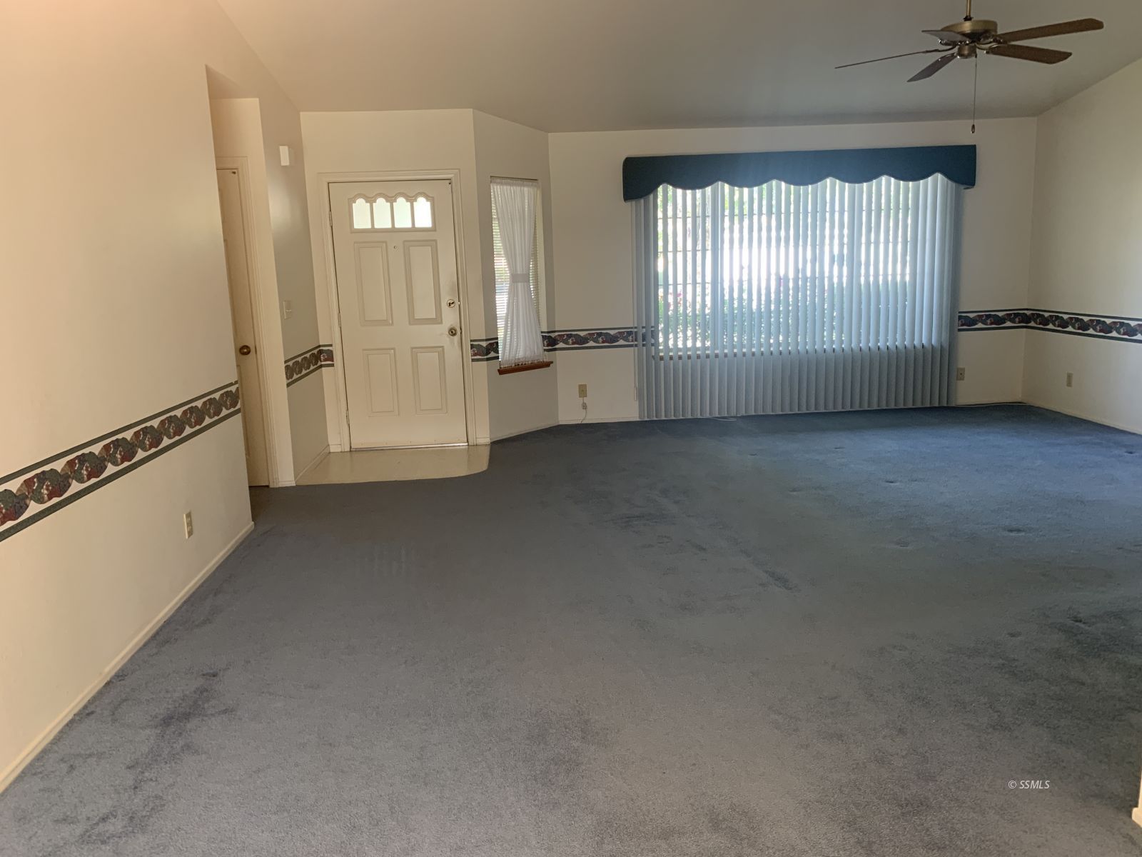 328 Ashton Street Ridgecrest, CA 93555 - Photo 6 of 28 an empty room with windows