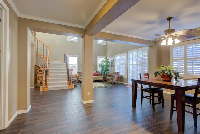 a view of a kitchen area kitchen island furniture and a chandelier