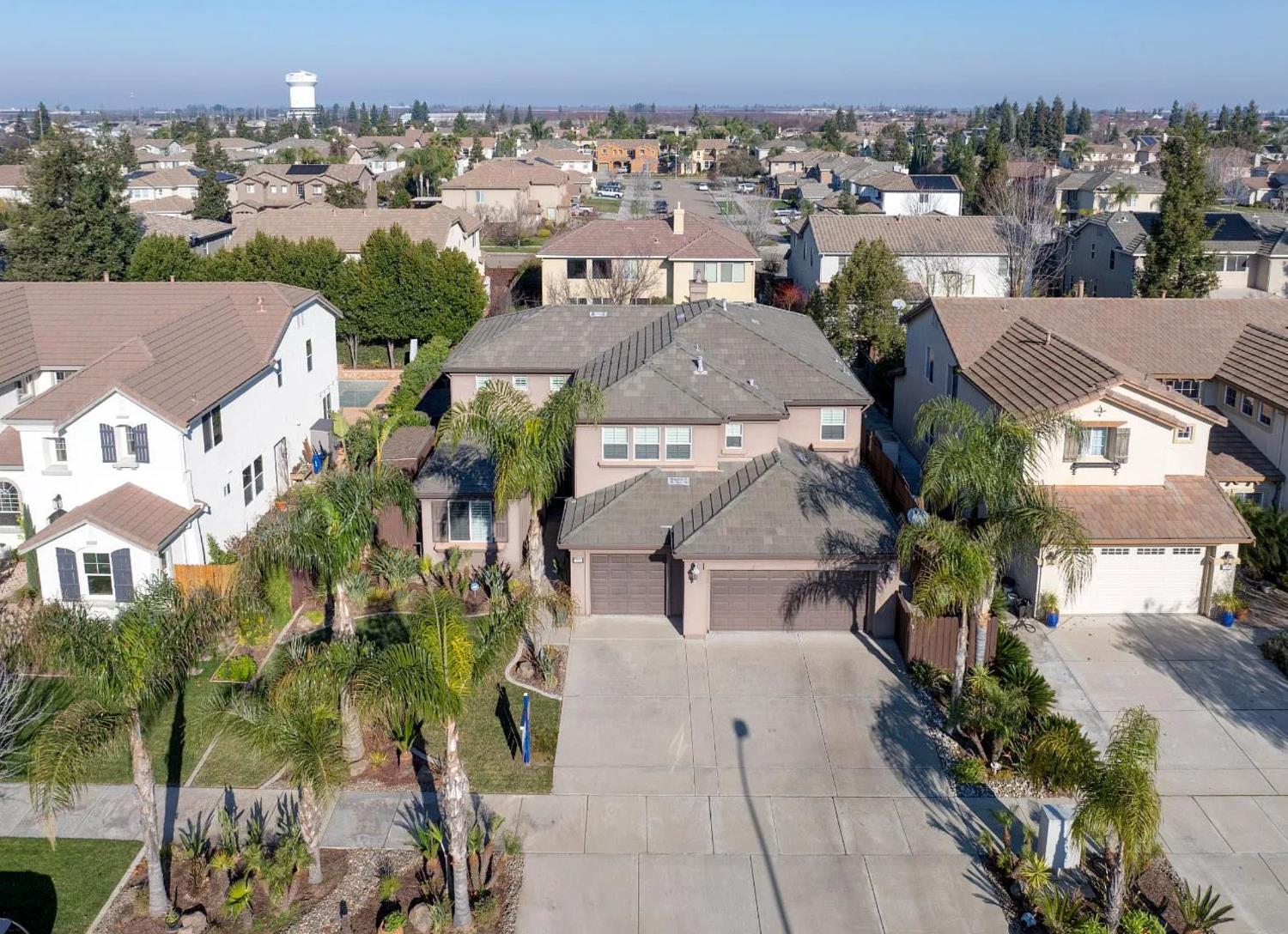 621 Bouma Lane Ripon, CA 95366 - Photo 2 of 78 an aerial view of multiple houses with a yard