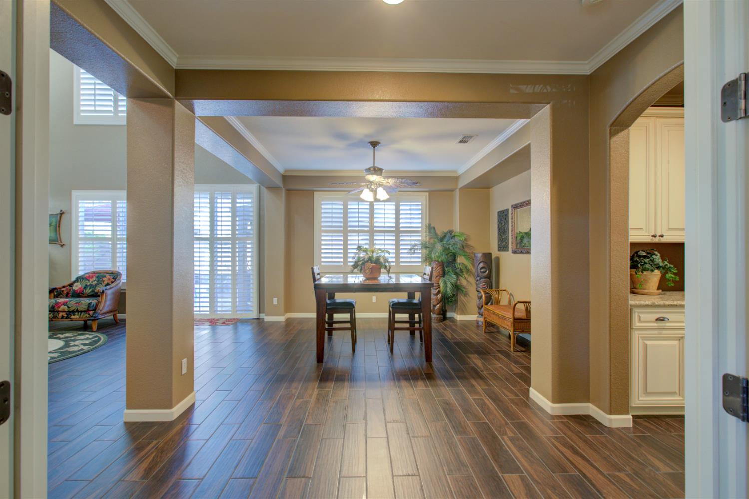 621 Bouma Lane Ripon, CA 95366 - Photo 31 of 78 a view of a dining room with furniture and wooden floor