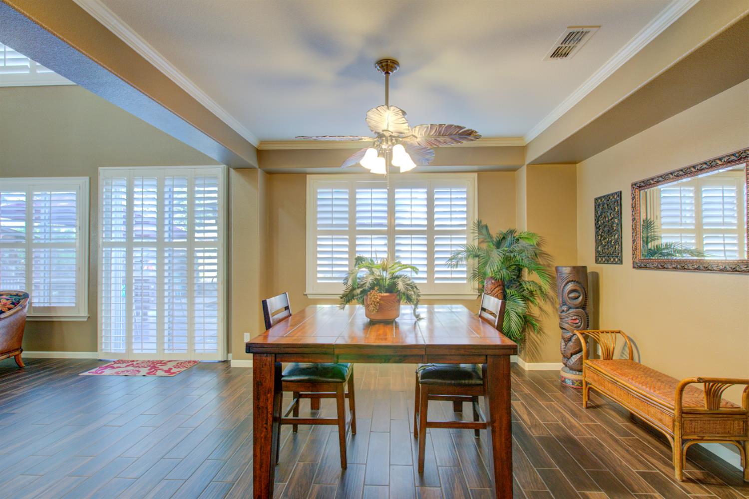 621 Bouma Lane Ripon, CA 95366 - Photo 33 of 78 a view of a dining room with furniture window and wooden floor
