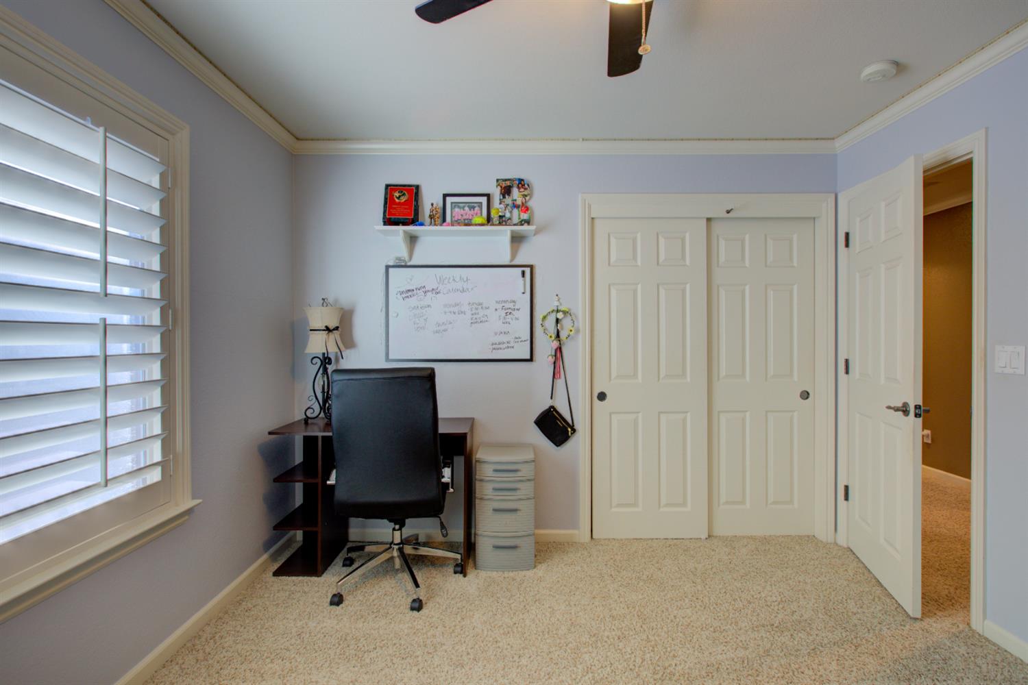 621 Bouma Lane Ripon, CA 95366 - Photo 51 of 78 a workspace with furniture and a window