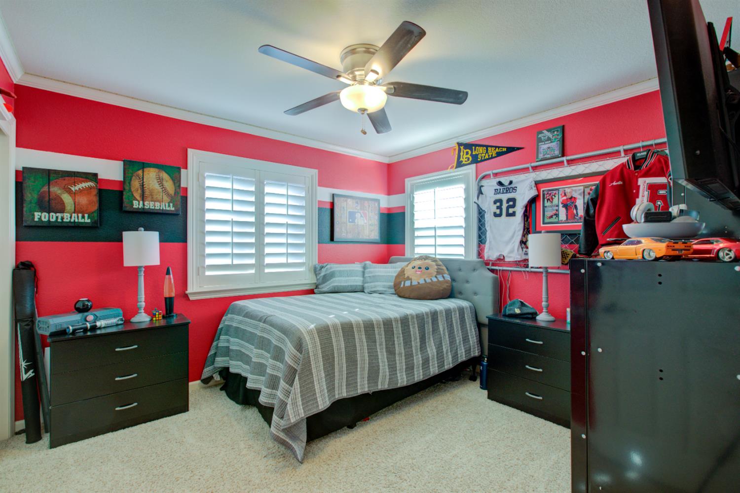 621 Bouma Lane Ripon, CA 95366 - Photo 55 of 78 a bedroom with a bed and a flat tv screen on dresser