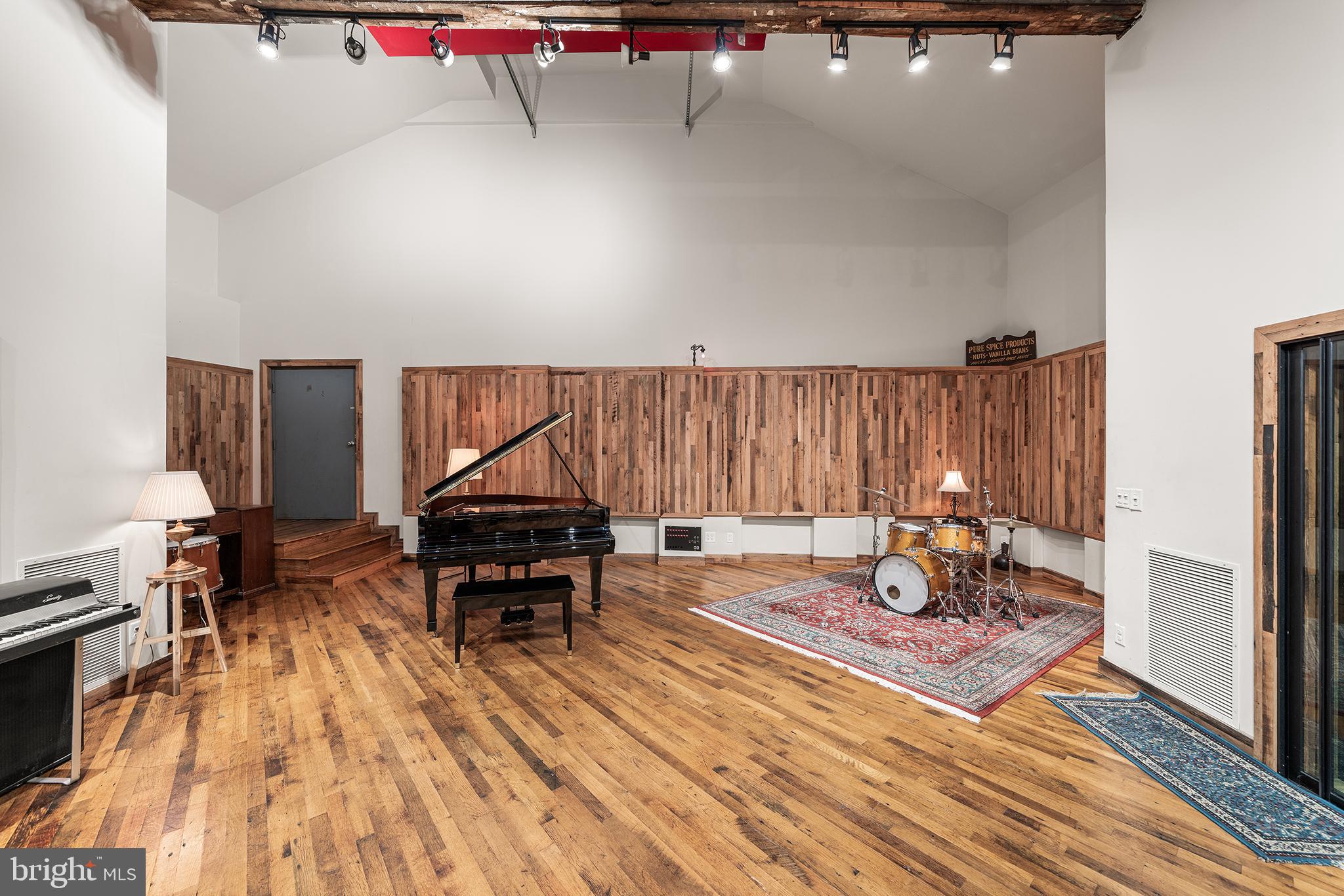 1506 East Wilt Street Philadelphia, PA 19125 - Photo 11 of 50 a living room with furniture a rug and a table