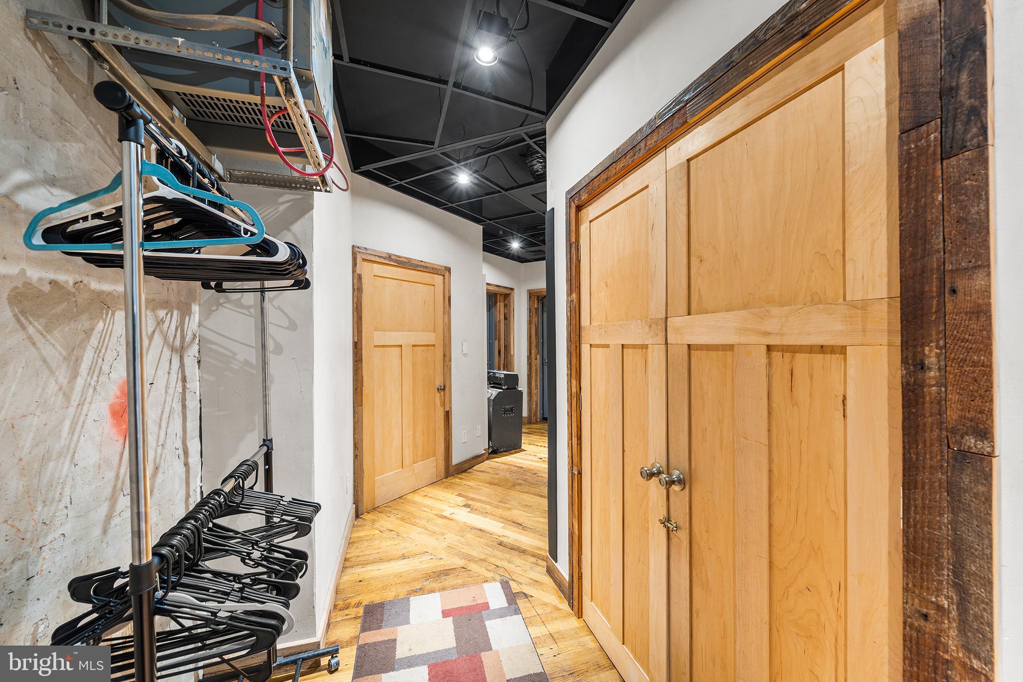 1506 East Wilt Street Philadelphia, PA 19125 - Photo 14 of 50 a view of walk in closet with clothes and shoes