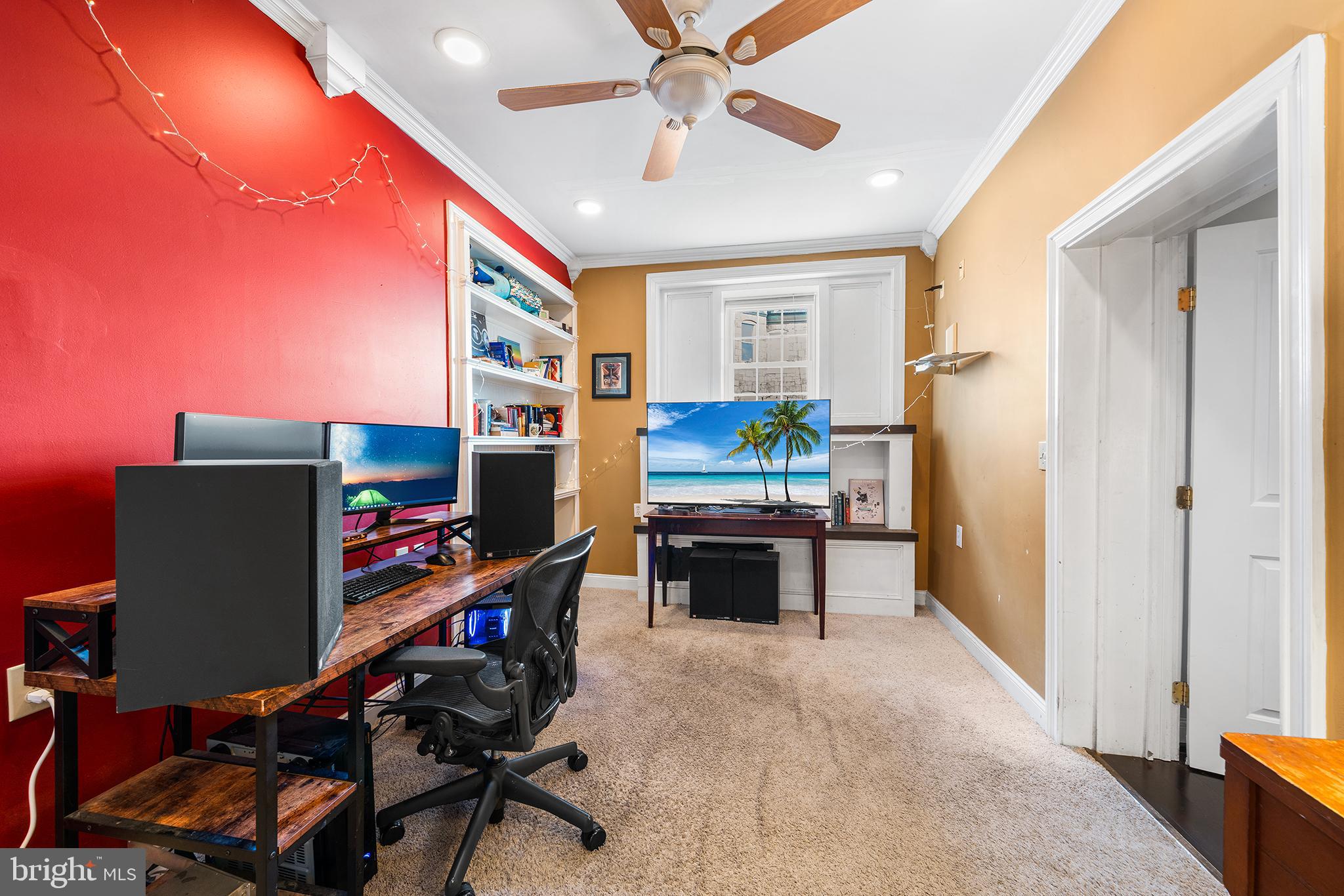 1506 East Wilt Street Philadelphia, PA 19125 - Photo 29 of 50 a work room with furniture and a flat screen tv