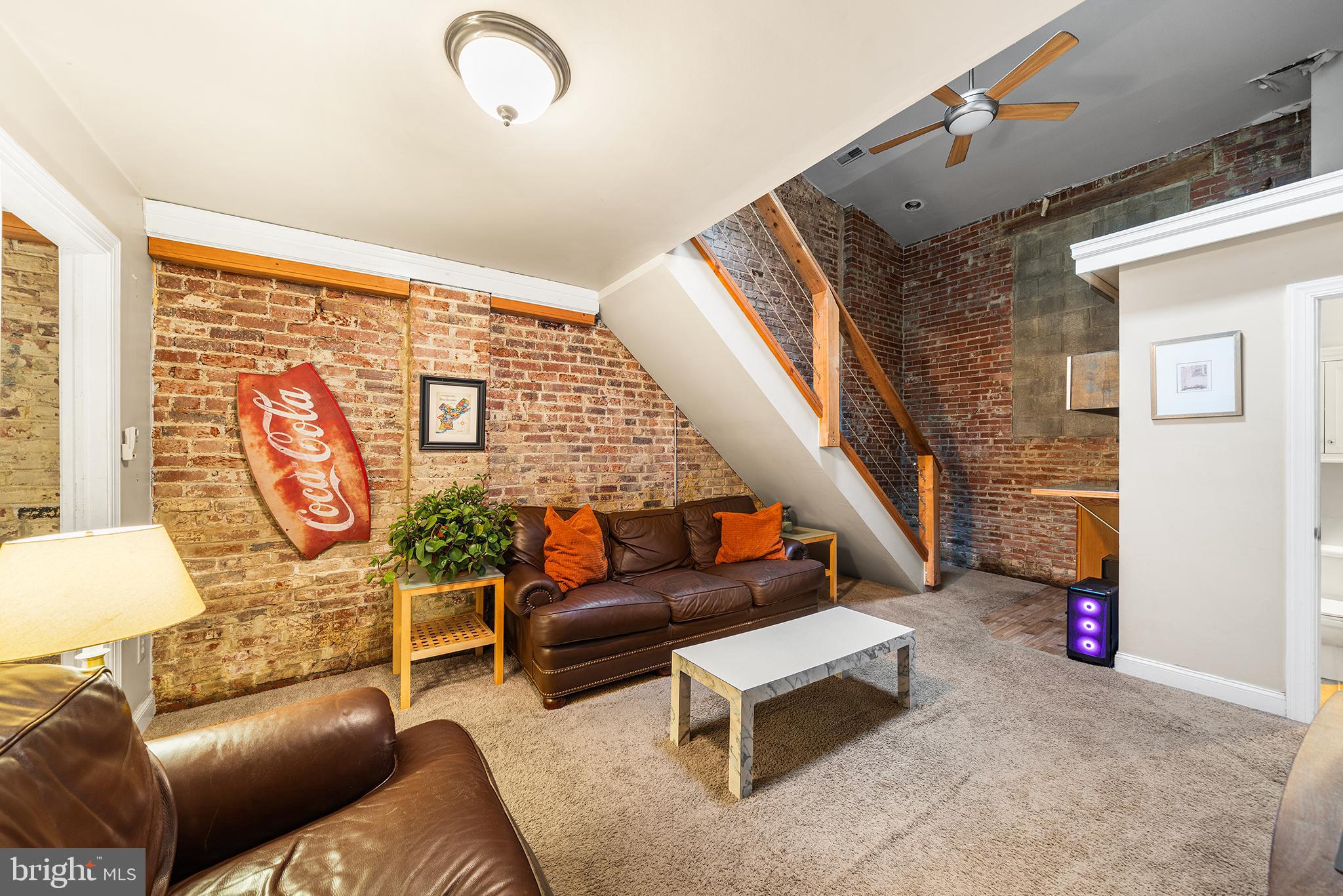 1506 East Wilt Street Philadelphia, PA 19125 - Photo 32 of 50 a living room with furniture and a wooden floor