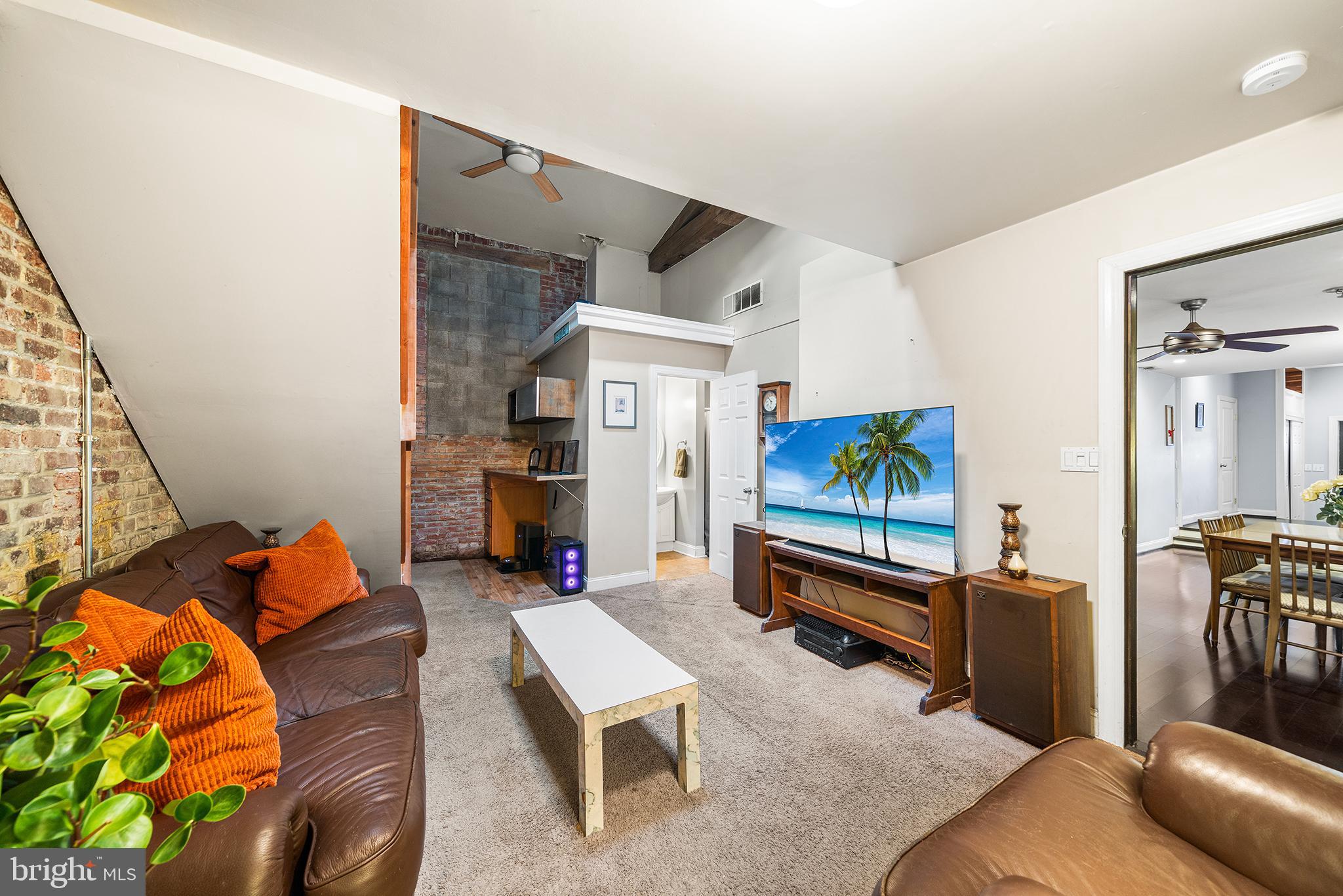 1506 East Wilt Street Philadelphia, PA 19125 - Photo 36 of 50 a living room with furniture and a flat screen tv