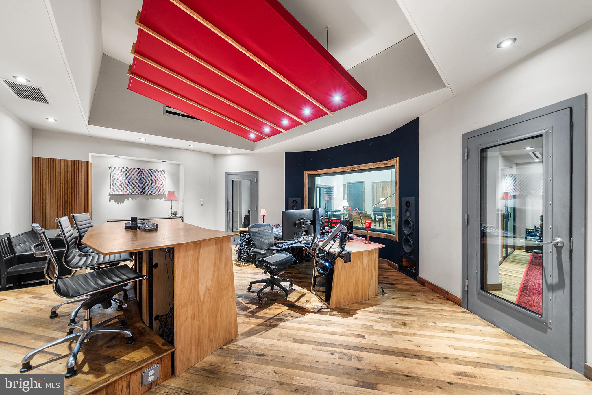 1506 East Wilt Street Philadelphia, PA 19125 - Photo 7 of 50 a view of a dining hall with furniture and wooden floor