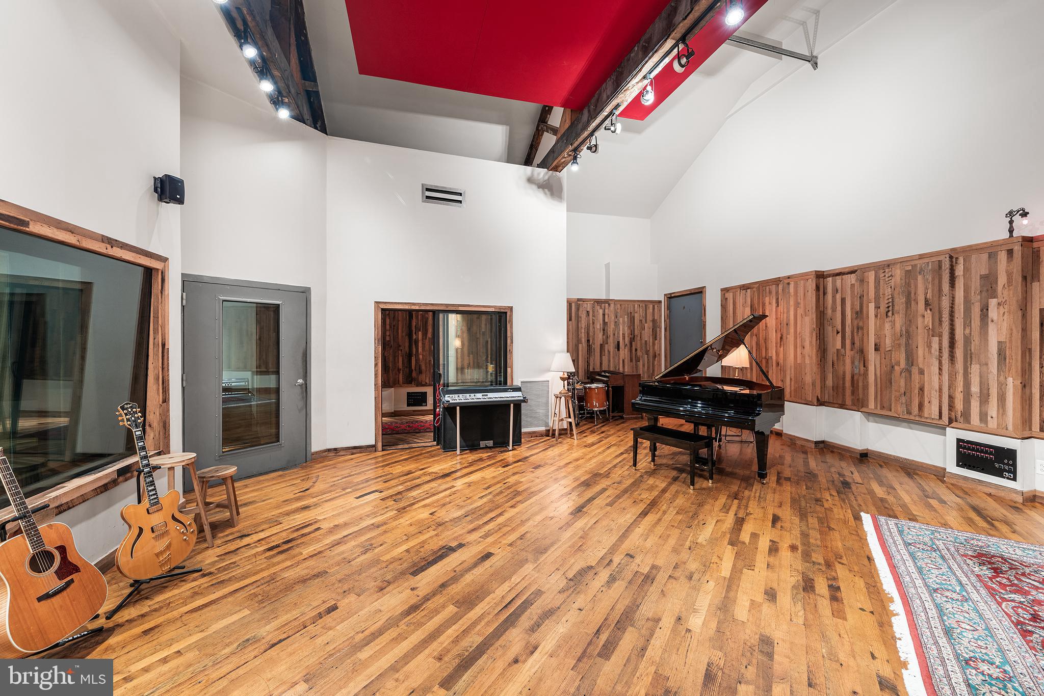 1506 East Wilt Street Philadelphia, PA 19125 - Photo 10 of 50 a view of a livingroom with furniture and a flat screen tv