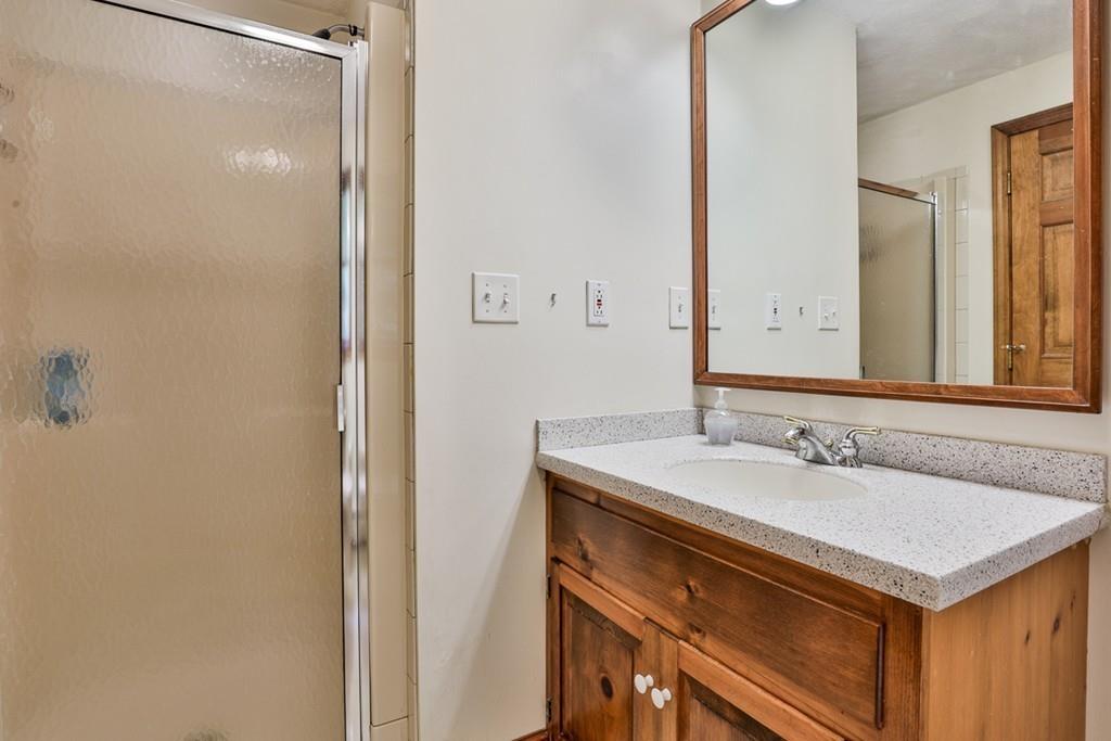 70 B Baldpate Road Boxford, MA 01921 - Photo 24 of 40 a bathroom with a sink and a mirror