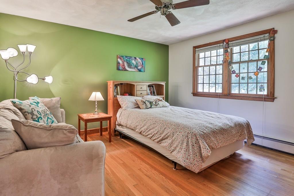 70 B Baldpate Road Boxford, MA 01921 - Photo 26 of 40 a bedroom with a bed wooden floor and window