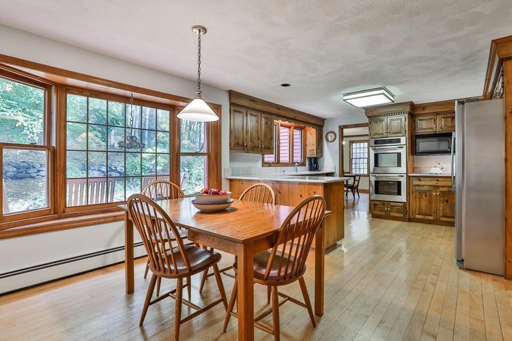 70 B Baldpate Road Boxford, MA 01921 - Photo 3 of 40 a dining room with furniture and window