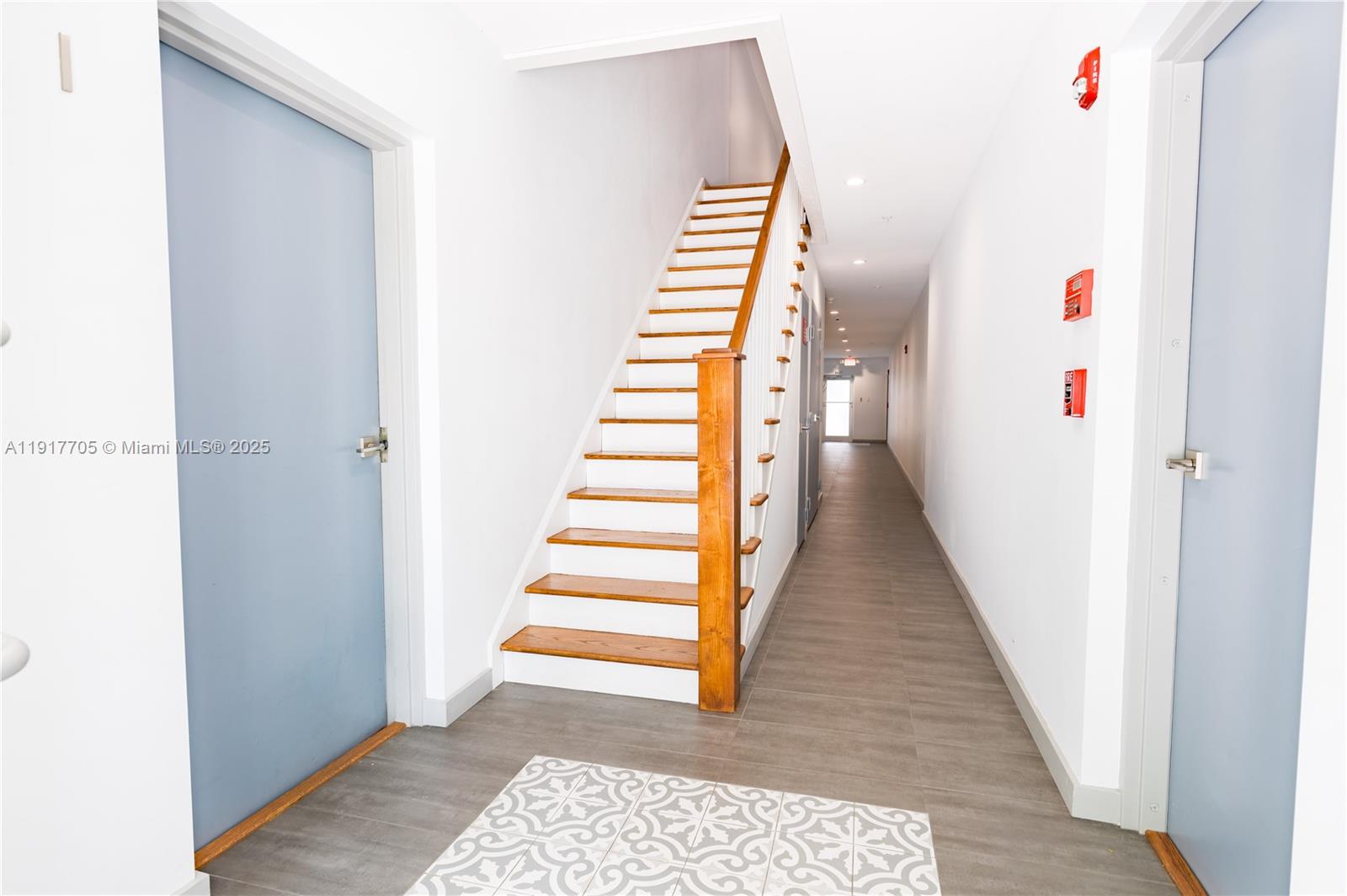 1814 Southwest 22nd Avenue, Unit 4 Miami, FL 33145 - Photo 10 of 11 a view of a hallway with stairs and wooden floor