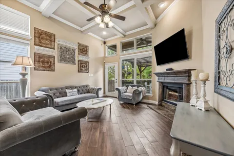 a kitchen with stainless steel appliances granite countertop a refrigerator and a stove