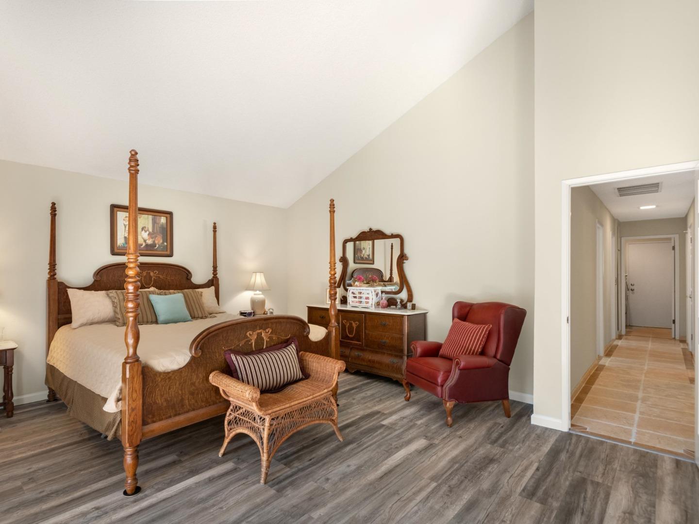 7026 Burnside Drive San Jose, CA 95120 - Photo 25 of 60 a bedroom with furniture and wooden floor