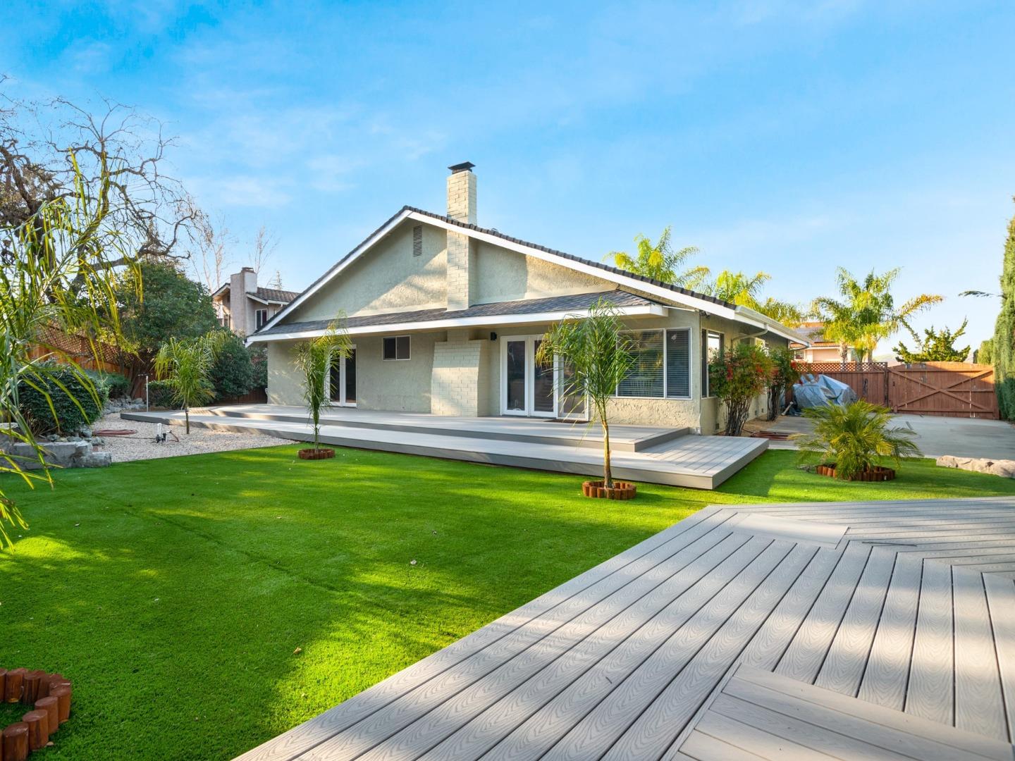 7026 Burnside Drive San Jose, CA 95120 - Photo 38 of 60 a front view of a house with yard and green space