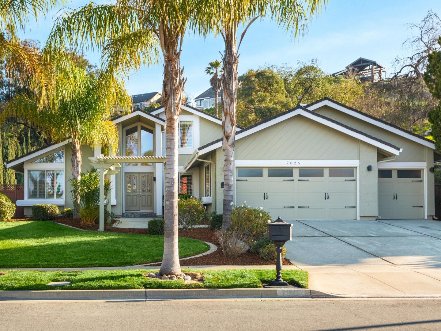 7026 Burnside Drive San Jose, CA 95120 - Photo 48 of 60 a view of a house with a yard and palm trees