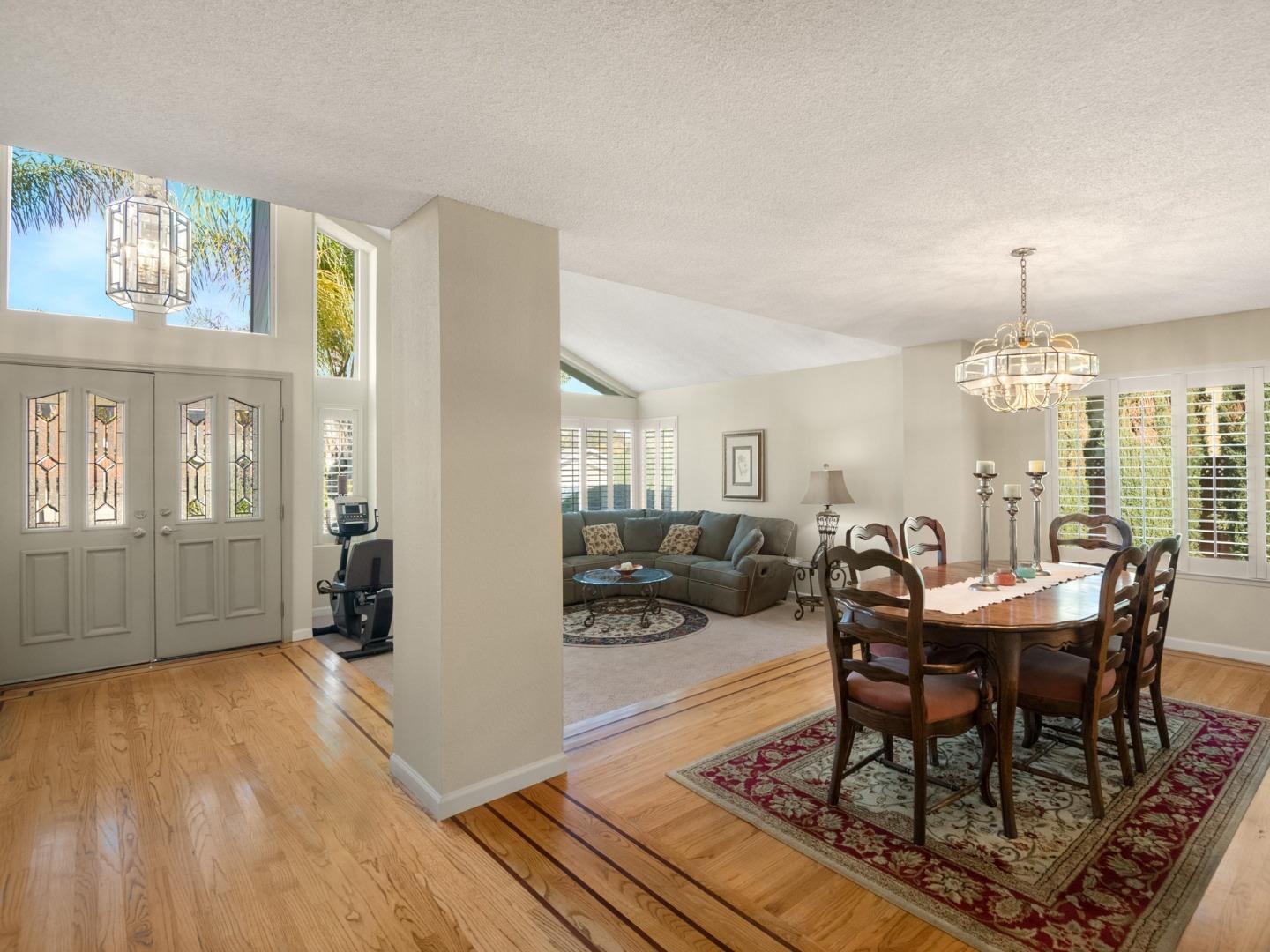 7026 Burnside Drive San Jose, CA 95120 - Photo 6 of 60 a view of a dining room with furniture window and wooden floor
