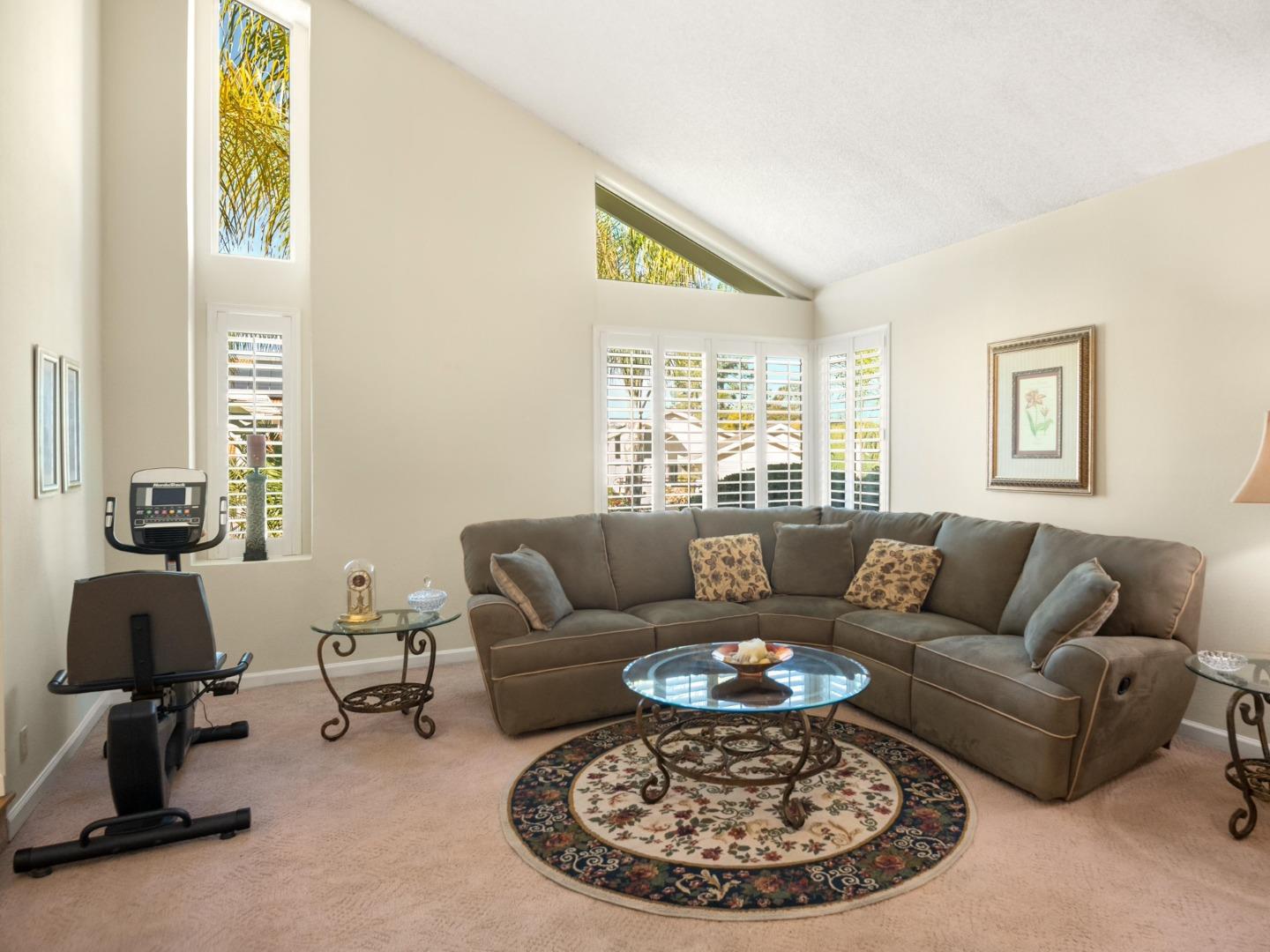 7026 Burnside Drive San Jose, CA 95120 - Photo 7 of 60 a living room with furniture and a large window