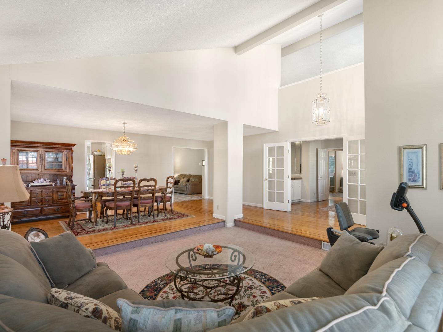 7026 Burnside Drive San Jose, CA 95120 - Photo 9 of 60 a living room with furniture and wooden floor
