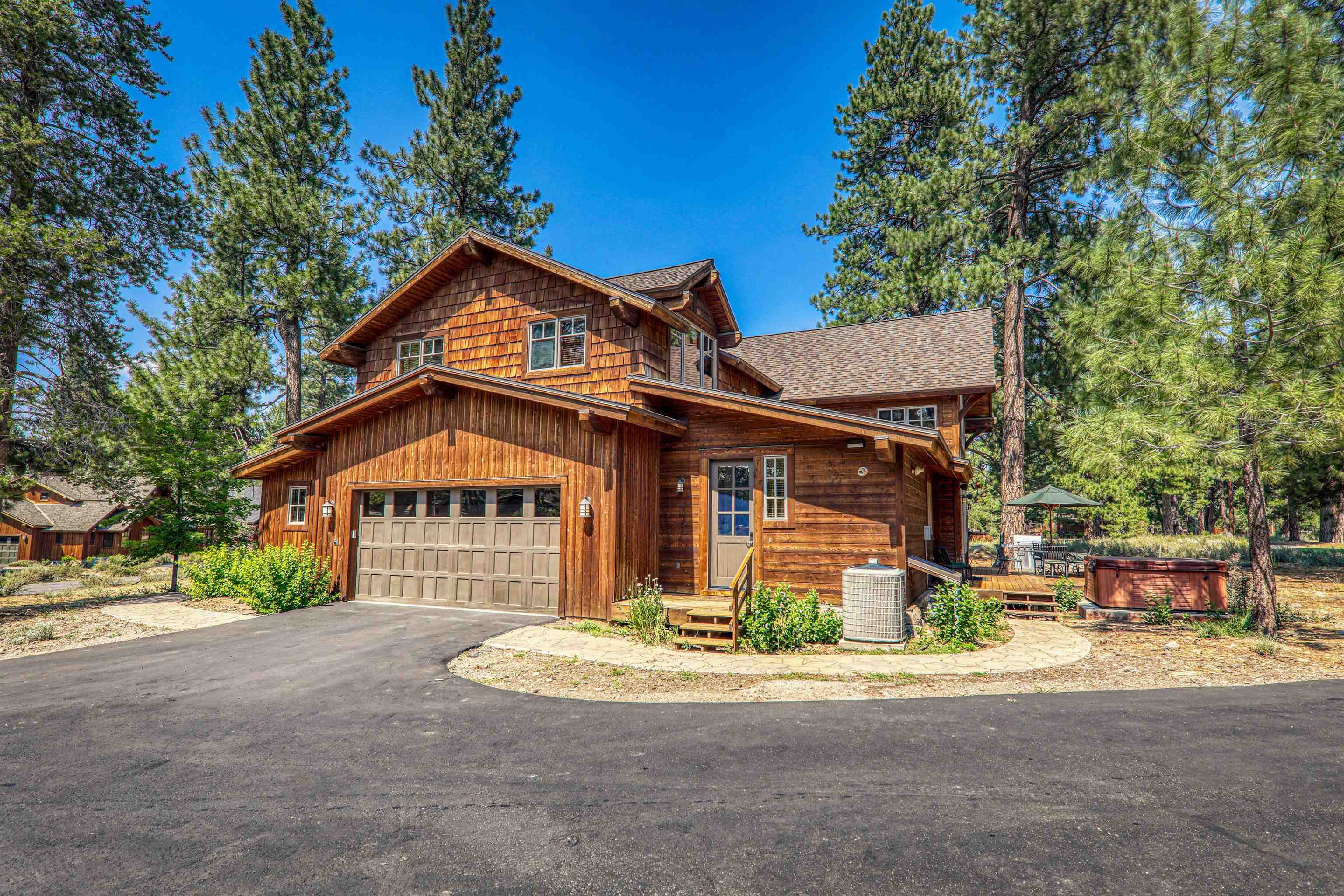 12423 Lookout Loop, Unit F1509 Truckee, CA 96161 - Photo 2 of 27 a front view of a house with a yard