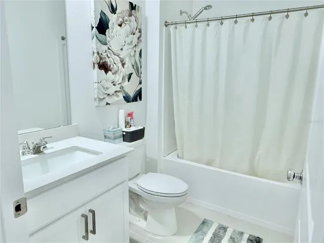 a view of a backyard of the house