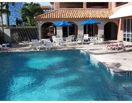 a view of swimming pool with patio