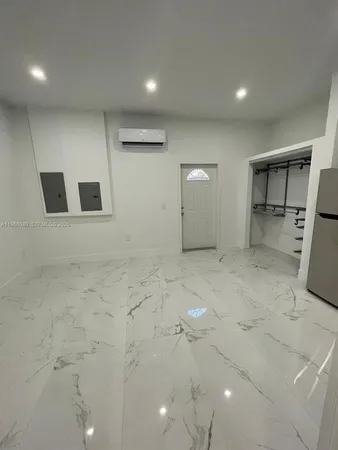 a view of a refrigerator in a room