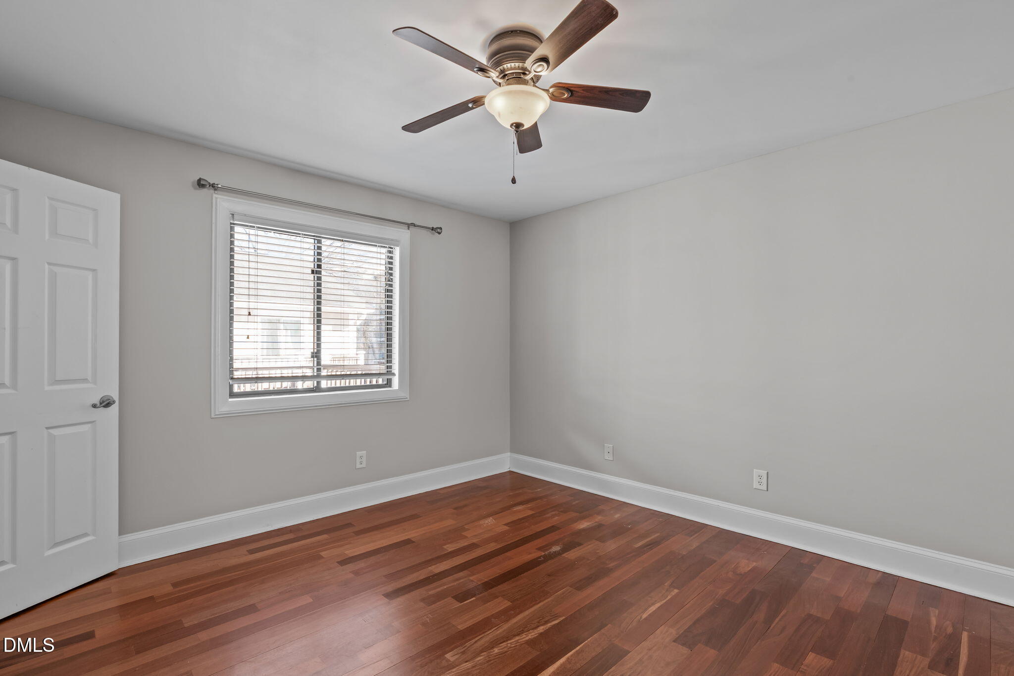 2208 Stafford Avenue Raleigh, NC 27607 - Photo 19 of 30 wooden floor in an empty room with a window