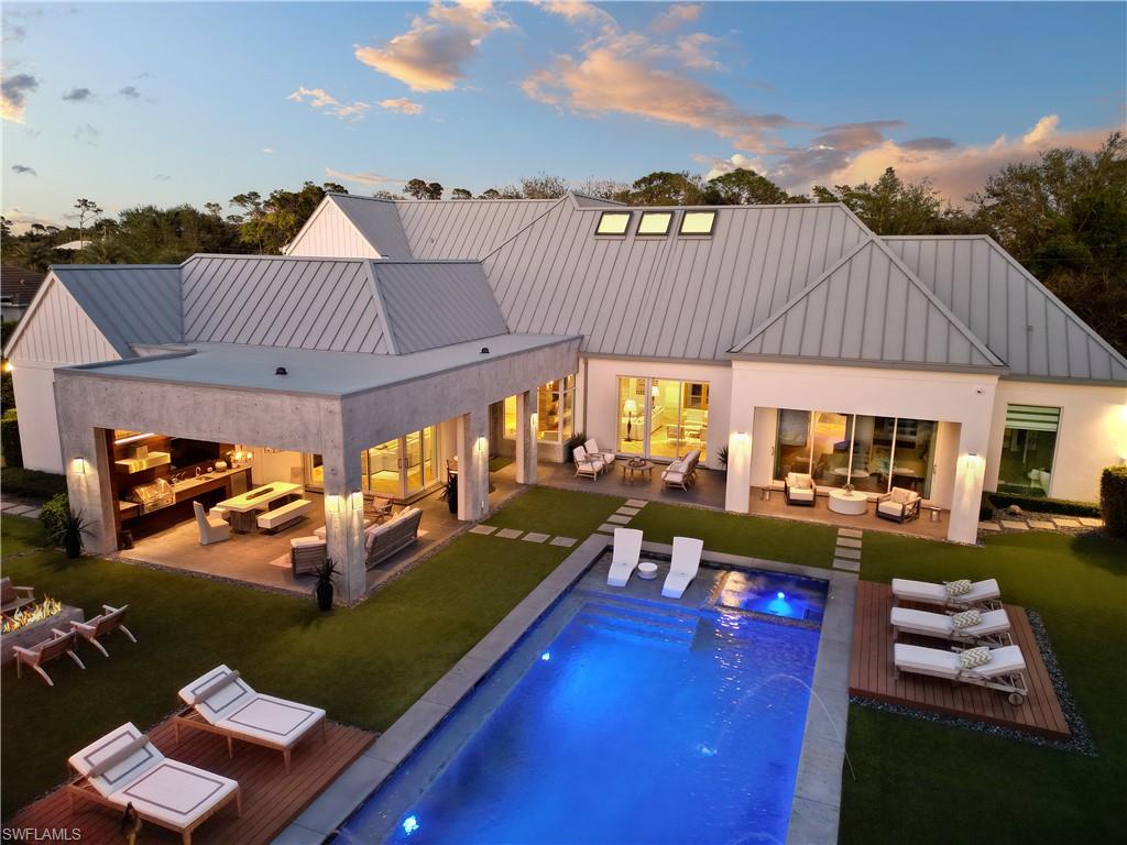 581 Myrtle Road Naples, FL 34108 - Photo 30 of 39 a view of a chairs and table in the patio