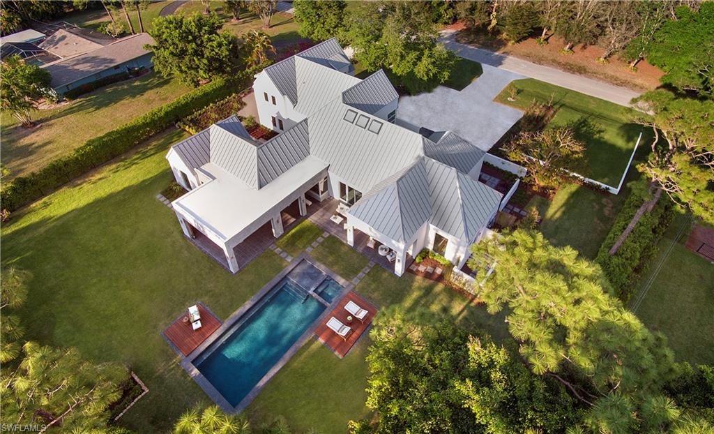 581 Myrtle Road Naples, FL 34108 - Photo 4 of 39 an aerial view of a house with a yard