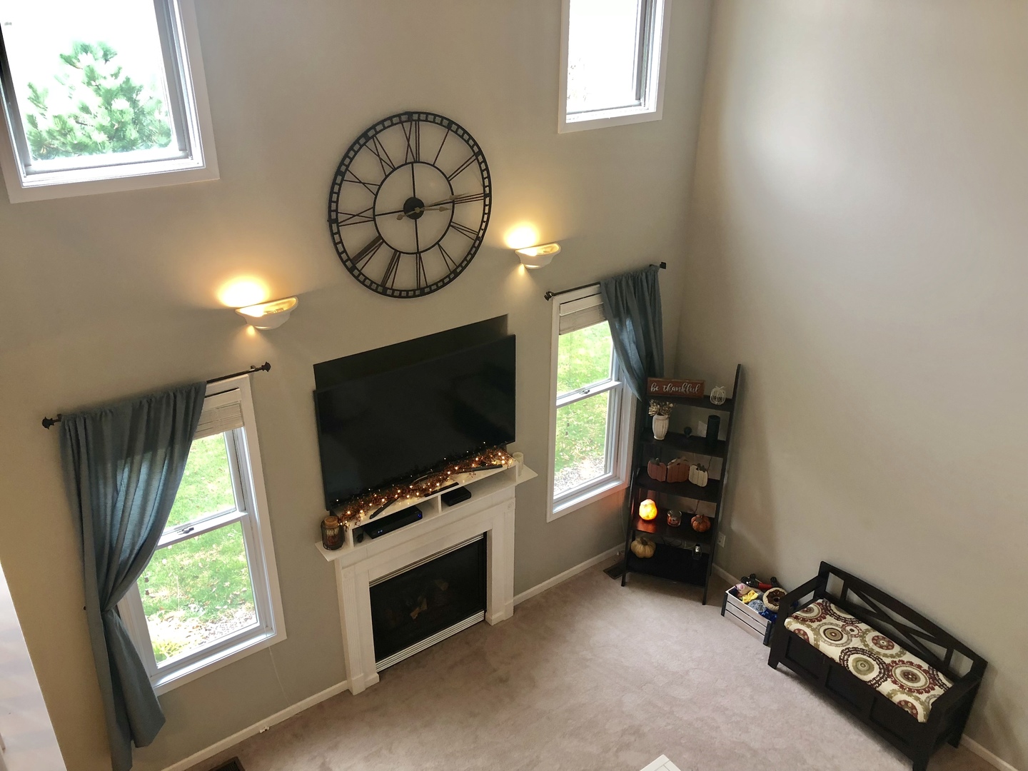 1422 Ridge Drive Sycamore, IL 60178 - Photo 2 of 21 a living room with furniture and a flat screen tv