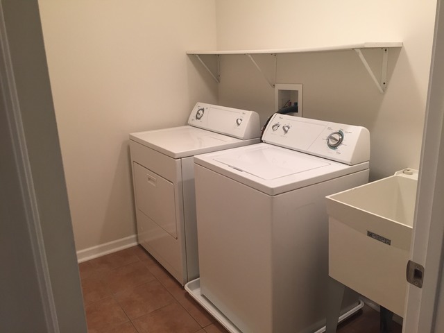 1422 Ridge Drive Sycamore, IL 60178 - Photo 14 of 21 a utility room with dryer and washer