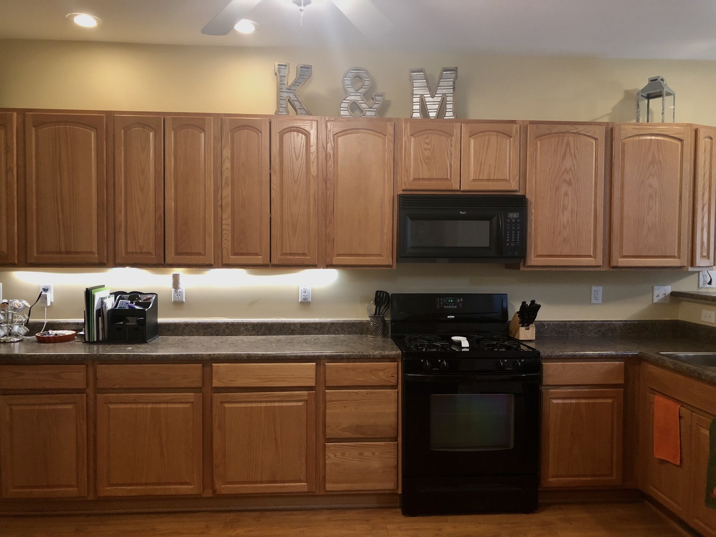 1422 Ridge Drive Sycamore, IL 60178 - Photo 8 of 21 a kitchen with granite countertop a cabinets and a stove top oven
