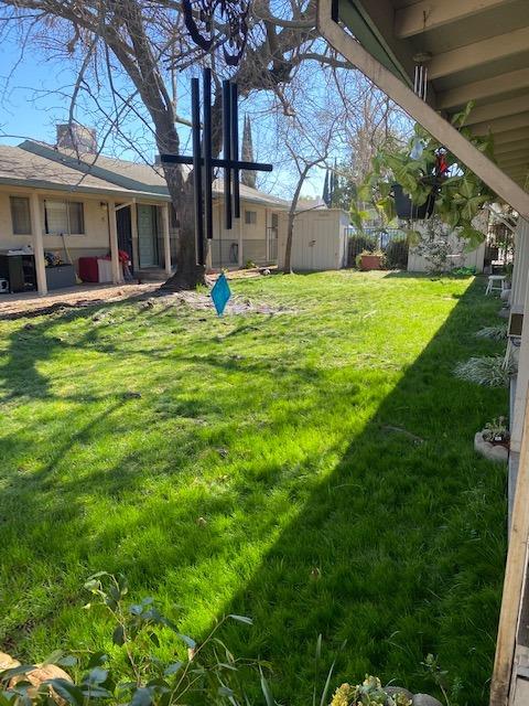 712 Main Street, Unit C Roseville, CA 95678 - Photo 8 of 8 a view of a house with a backyard porch and sitting area